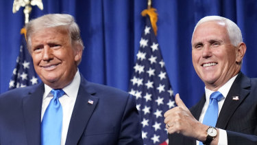 President Donald Trump and Vice President Mike Pence stand on stage during the first day of the 2020 RNC