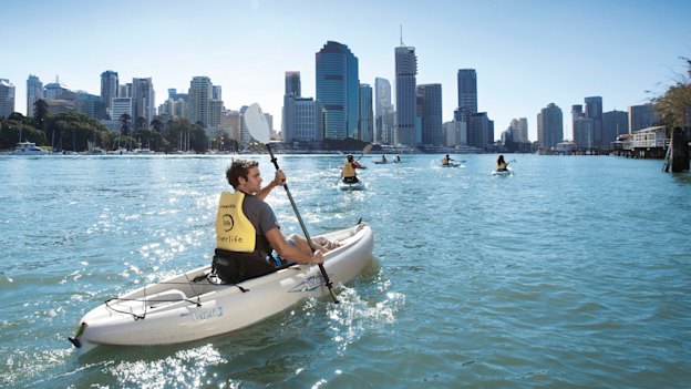 The Riverlife armada setting paddle down the Brisbane River.