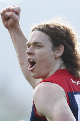 Ben Brown celebrates a goal against his former side, North Melbourne.