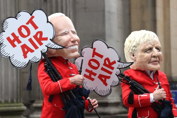 Protestors dressed as US President Joe Biden and British Prime Minister Boris Johnson who were among the world leaders to attend the summit.