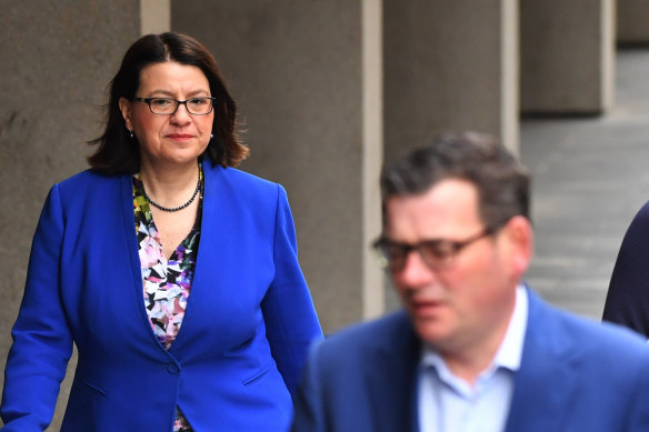 Victorian Health Minister Jenny Mikakos and Premier Daniel Andrews on their way to a COVID-19 press conference on Friday.