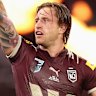 Queensland captain Cameron Munster celebrates victory at full-time.