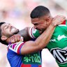Dylan Brown tries to contain Latrell Mitchell on Sunday.