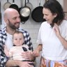 Ted Adair and Courteney Boulter, pictured with their son Avery and dog Chewy, are selling their one bedroom home in Port Melbourne and are looking to upsize. 