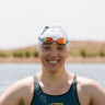 Peta Bradley wearing the racing suit she wore at the World Ice Swimming Championships, on her property in Armatree, NSW.