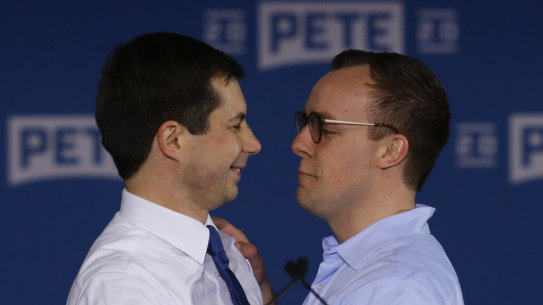 Pete Buttigieg, left, is joined by his husband Chasten Glezman after announcing he will seek the Democratic presidential nomination.
