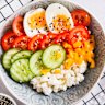 Cottage cheese bowls with added vegetables and eggs make a great protein hit.