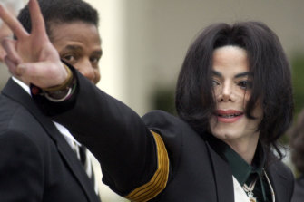 Found innocent: Late-pop icon Michael Jackson waving to his supporters at his child molestation trial at the Santa Barbara County Superior Court in California in 2005.