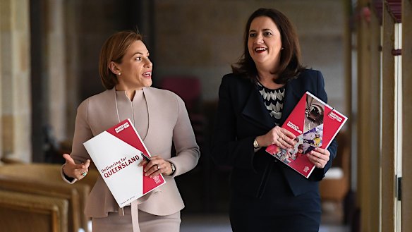 Treasurer Jackie Trad and Queensland Premier Annastacia Palaszczuk arrive for the budget media lockup.