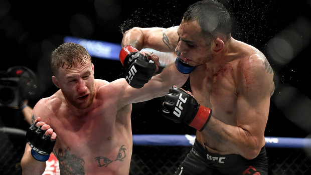 Justin Gaethje (left) on his way to victory over Tony Ferguson for the interim lightweight title at UFC 249.