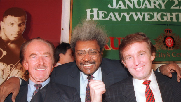 Donald Trump, pictured with his father, Fred Trump and boxing promoter Don King in 1987.