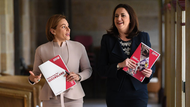 Treasurer Jackie Trad and Queensland Premier Annastacia Palaszczuk arrive for the budget media lockup.