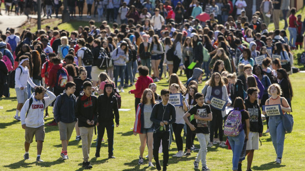 Students at Clarke Central High School in Athens, Georgia walk out to protest against school shootings.