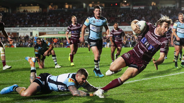 Last gasp: Brendan Elliot adds insult to injury for the Sharks.