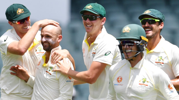 Another one bites the dust: Australian players celebrate the dismissal of Rohit Sharma.