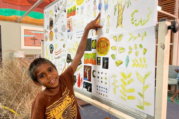 Purnululu School student Berylin Mung Mung with the artwork he created after taking part in the Jajoo Warrngara storytelling program.