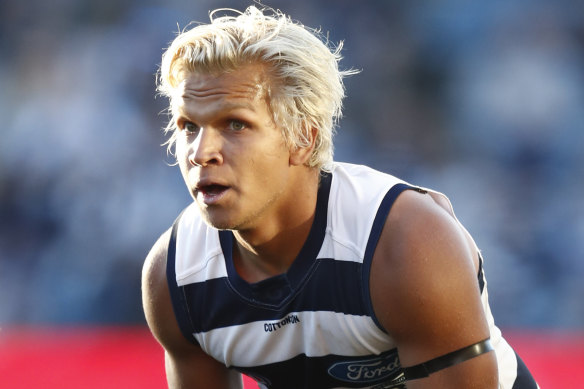Former Cats player Quinton Narkle has been picked up by Port Adelaide.