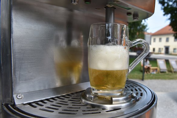 You access the beer using a microchipped souvenir glass.