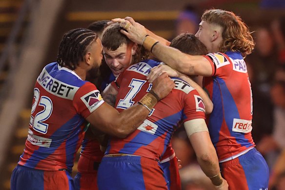 Knights players delighted after a try.