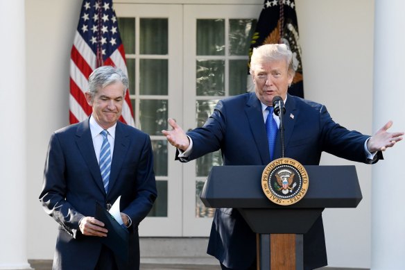 Donald Trump has been at loggerheads with Federal Reserve chief Jerome Powell (left).