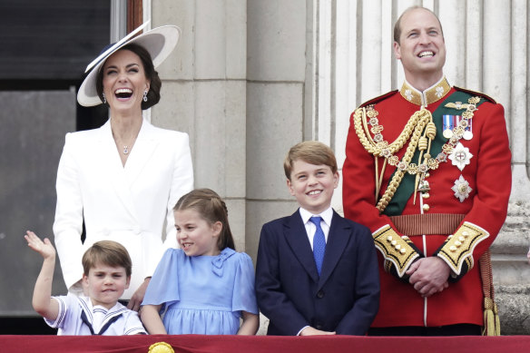 Prince George, second from right, watches the Queen’s Jubilee celebrations with his siblings Louis and Charlotte and parents Catherine and William from the balcony of Buckingham Place last year.