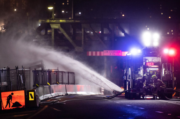 Fire and Rescue NSW crews dispersing gas while the supply is being turned off.