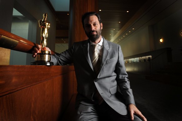 Australian producer Emile Sherman with the best picture Oscar he won for The King’s Speech.