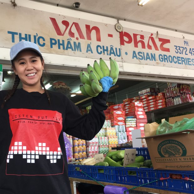 Vi Nguyen manages her parent's store Van Phat at Inala Plaza. 