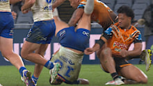 Leo Thompson flips on to his head after the tackle by Latu Fainu.