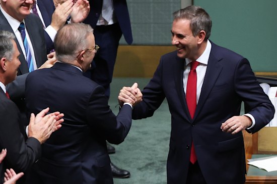 Albanese and Chalmers shake hands.