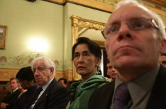 Sean Turnell, right, with Aung San Suu Kyi, centre, and Frank Lowy, left, at the Lowy Institute in 2013.