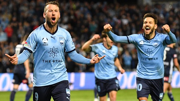 Spot on: Sydney's Adam Le Fondre celebrates his penalty goal.