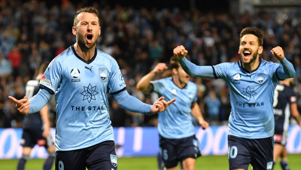 Spot on: Sydney's Adam Le Fondre celebrates his penalty goal to help the Sky Blues reach the grand final.