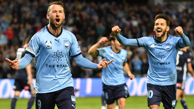 Spot on: Sydney's Adam Le Fondre celebrates his penalty goal.