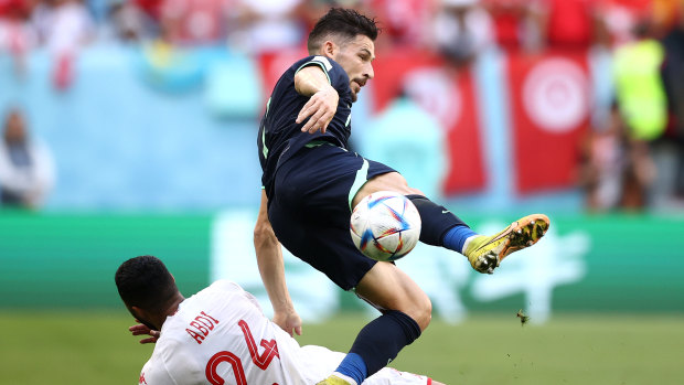 Mat Leckie tries to keep possession for the Socceroos.