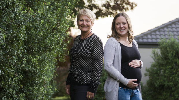 Professor of midwifery at the University of Canberra and ACT Health Deborah Davis who led the research, and expectant mother and midwife Sam Lawry (right)