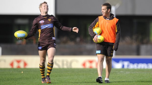 Reversal: Sam Mitchell (left) with Alastair Clarkson during his time at Hawthorn.