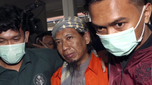 Oman Rohman, centre, the key ideologue for Islamic State militants in Indonesia, on trial earlier this year for ordering a 2016 suicide bombing and gun attack in Jakarta that killed eight people, including the four attackers. 