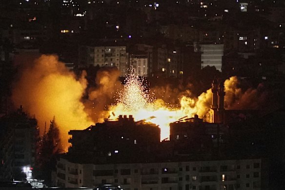 Flames and smoke following an Israeli airstrike on Dahiyeh in southern Beirut.