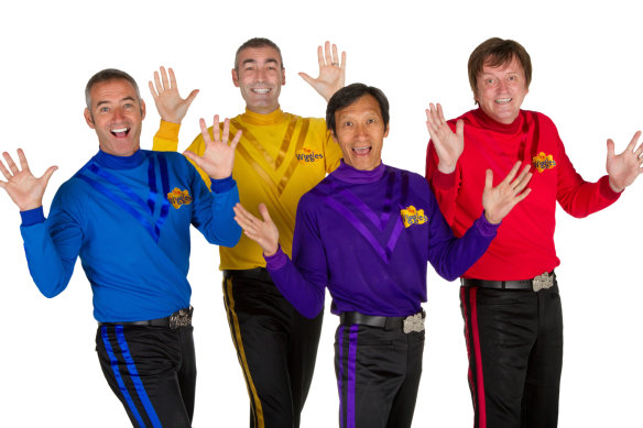 Cook, right, with the original Wiggles, (L-R) Anthony Field, Greg Page and Jeff Fatt.