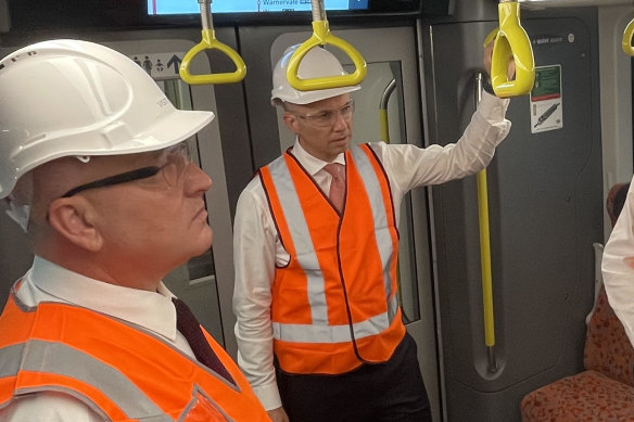 Hold on ... NSW Transport Minister David Elliott and Treasurer Matt Kean, bitter Liberal rivals.