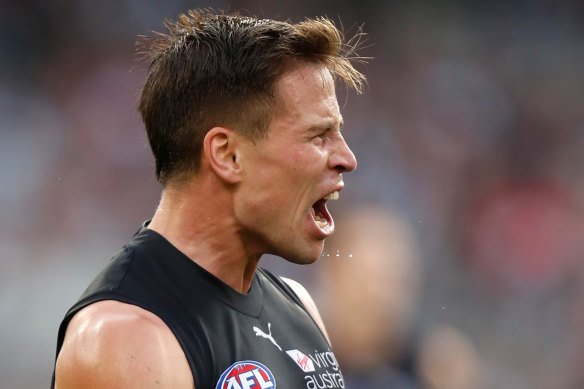 Matthew Owies celebrates a goal for the Blues against the old enemy, Essendon.