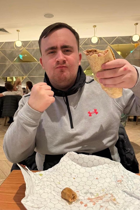 Littler enjoys a kebab in December 2023.