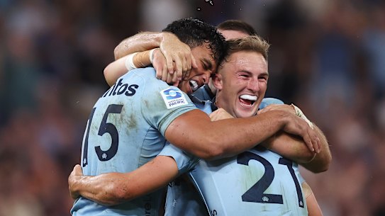SYDNEY, AUSTRALIA - APRIL 11:  Joseph-Aukuso Suaalii and Jack Bowen of the Waratahs celebrate victory following the round nine Super Rugby Pacific match between NSW Waratahs and Chiefs at Allianz Stadium, on April 11, 2025, in Sydney, Australia. (Photo by Mark Metcalfe/Getty Images)