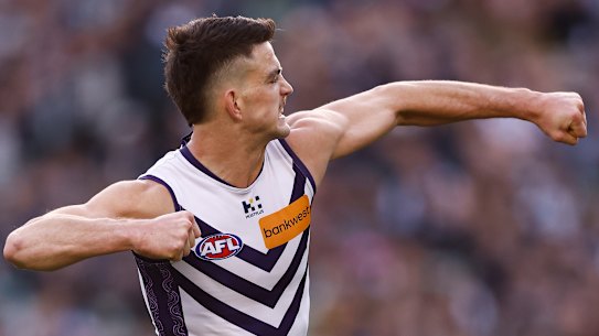 A fired-up Patrick Voss celebrates a key goal against Collingwood.