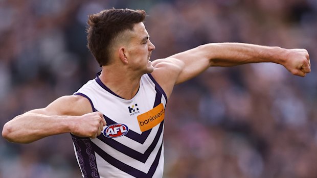A fired-up Patrick Voss celebrates a key goal against Collingwood.