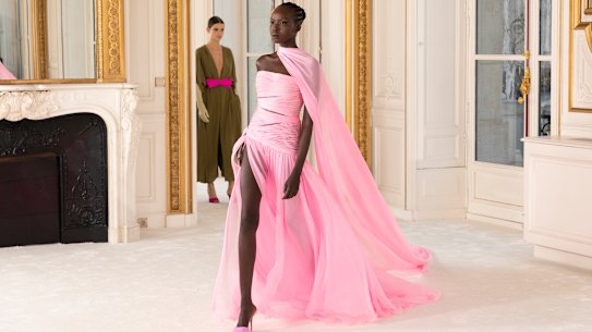 Australian model Ajok Madel walks in the Valentino haute couture, spring/summer 2022 show in Paris.