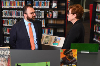 Caroline Chisholm Catholic College principal Marco DiCesare and information services co-ordinator Barbara Roach in the school's library. 