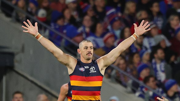 Taylor Walker of the Crows celebrates a goal.