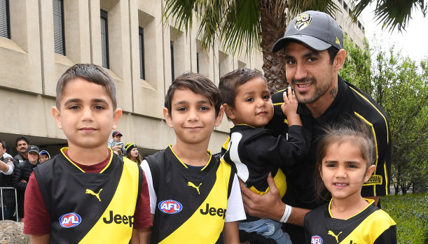 Marlion Pickett with his children (from left) Marlion jnr, Latrell, Levi and Shaniquae at the 2019 grand final parade.
